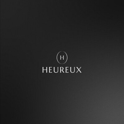 Trademark HEUREUX + LOGO